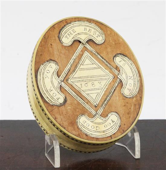 A 17th century oval horn, fruitwood and bone inlaid snuff box, 3.5 x 3in.